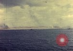 Image of bombardment of shoreline Iwo Jima, 1945, second 17 stock footage video 65675029810