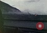 Image of bombardment of shoreline Iwo Jima, 1945, second 22 stock footage video 65675029810