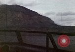 Image of bombardment of shoreline Iwo Jima, 1945, second 51 stock footage video 65675029810