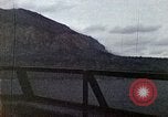 Image of bombardment of shoreline Iwo Jima, 1945, second 52 stock footage video 65675029810