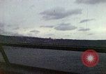 Image of bombardment of shoreline Iwo Jima, 1945, second 57 stock footage video 65675029810