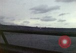 Image of bombardment of shoreline Iwo Jima, 1945, second 58 stock footage video 65675029810