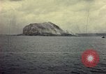 Image of bombardment of Mount Suribachi Iwo Jima, 1945, second 21 stock footage video 65675029812