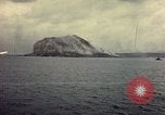 Image of bombardment of Mount Suribachi Iwo Jima, 1945, second 22 stock footage video 65675029812