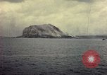 Image of bombardment of Mount Suribachi Iwo Jima, 1945, second 23 stock footage video 65675029812