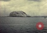 Image of bombardment of Mount Suribachi Iwo Jima, 1945, second 27 stock footage video 65675029812