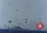Image of USS Tennessee (BB-43) struck by Kamikaze Pacific Ocean, 1945, second 14 stock footage video 65675029816