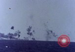 Image of USS Tennessee (BB-43) struck by Kamikaze Pacific Ocean, 1945, second 33 stock footage video 65675029816
