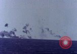 Image of USS Tennessee (BB-43) struck by Kamikaze Pacific Ocean, 1945, second 38 stock footage video 65675029816