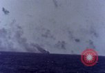 Image of USS Tennessee (BB-43) struck by Kamikaze Pacific Ocean, 1945, second 52 stock footage video 65675029816