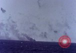 Image of USS Tennessee (BB-43) struck by Kamikaze Pacific Ocean, 1945, second 54 stock footage video 65675029816