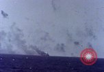 Image of USS Tennessee (BB-43) struck by Kamikaze Pacific Ocean, 1945, second 55 stock footage video 65675029816