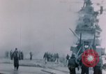 Image of Chaplain prays over wounded sailor Japan, 1945, second 3 stock footage video 65675029821