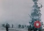 Image of Chaplain prays over wounded sailor Japan, 1945, second 4 stock footage video 65675029821