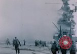 Image of Chaplain prays over wounded sailor Japan, 1945, second 5 stock footage video 65675029821
