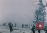 Image of Chaplain prays over wounded sailor Japan, 1945, second 6 stock footage video 65675029821