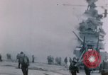 Image of Chaplain prays over wounded sailor Japan, 1945, second 7 stock footage video 65675029821