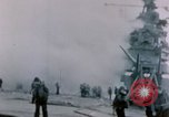 Image of Chaplain prays over wounded sailor Japan, 1945, second 8 stock footage video 65675029821