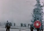 Image of Chaplain prays over wounded sailor Japan, 1945, second 9 stock footage video 65675029821