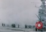 Image of Chaplain prays over wounded sailor Japan, 1945, second 15 stock footage video 65675029821