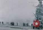 Image of Chaplain prays over wounded sailor Japan, 1945, second 16 stock footage video 65675029821