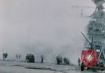 Image of Chaplain prays over wounded sailor Japan, 1945, second 17 stock footage video 65675029821