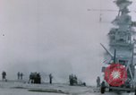 Image of Chaplain prays over wounded sailor Japan, 1945, second 18 stock footage video 65675029821