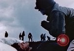 Image of Chaplain prays over wounded sailor Japan, 1945, second 30 stock footage video 65675029821