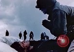 Image of Chaplain prays over wounded sailor Japan, 1945, second 31 stock footage video 65675029821