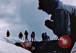 Image of Chaplain prays over wounded sailor Japan, 1945, second 33 stock footage video 65675029821