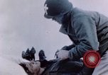 Image of Chaplain prays over wounded sailor Japan, 1945, second 35 stock footage video 65675029821