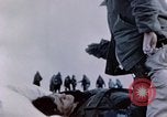 Image of Chaplain prays over wounded sailor Japan, 1945, second 41 stock footage video 65675029821