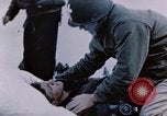 Image of Chaplain prays over wounded sailor Japan, 1945, second 44 stock footage video 65675029821