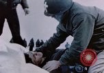Image of Chaplain prays over wounded sailor Japan, 1945, second 45 stock footage video 65675029821