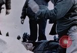 Image of Chaplain prays over wounded sailor Japan, 1945, second 47 stock footage video 65675029821