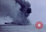 Image of USS Bunker Hill struck by Kamikazes Japan, 1945, second 32 stock footage video 65675029822