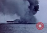 Image of USS Bunker Hill struck by Kamikazes Japan, 1945, second 39 stock footage video 65675029822