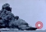 Image of USS Bunker Hill struck by Kamikazes Japan, 1945, second 59 stock footage video 65675029822