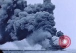 Image of burning American aircraft carrier Japan, 1945, second 12 stock footage video 65675029824