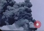Image of burning American aircraft carrier Japan, 1945, second 16 stock footage video 65675029824