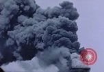 Image of burning American aircraft carrier Japan, 1945, second 17 stock footage video 65675029824