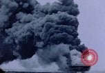 Image of burning American aircraft carrier Japan, 1945, second 19 stock footage video 65675029824