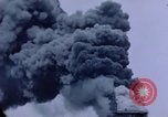 Image of burning American aircraft carrier Japan, 1945, second 20 stock footage video 65675029824