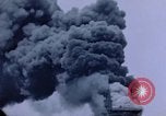 Image of burning American aircraft carrier Japan, 1945, second 21 stock footage video 65675029824