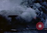 Image of burning American aircraft carrier Japan, 1945, second 22 stock footage video 65675029824