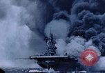 Image of burning American aircraft carrier Japan, 1945, second 36 stock footage video 65675029824