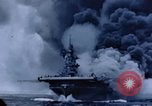 Image of burning American aircraft carrier Japan, 1945, second 37 stock footage video 65675029824