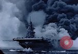 Image of burning American aircraft carrier Japan, 1945, second 39 stock footage video 65675029824