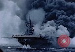 Image of burning American aircraft carrier Japan, 1945, second 40 stock footage video 65675029824