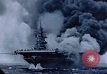 Image of burning American aircraft carrier Japan, 1945, second 41 stock footage video 65675029824